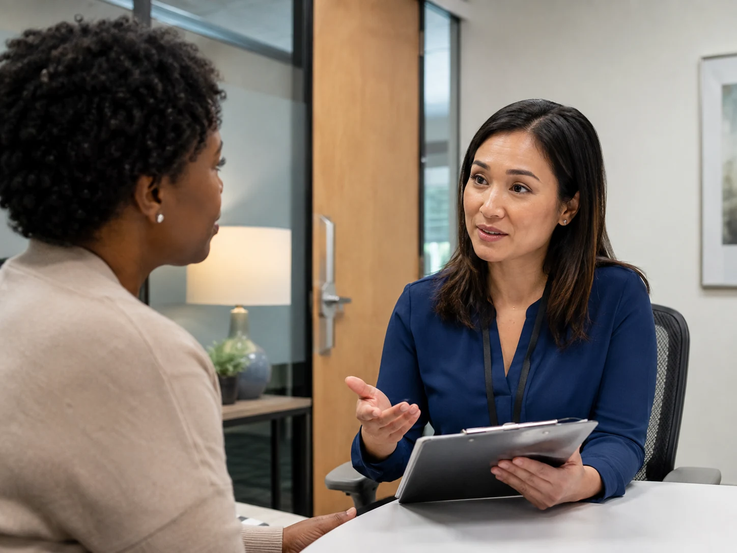 Research coordinator explaining a clinical study to a potential participant